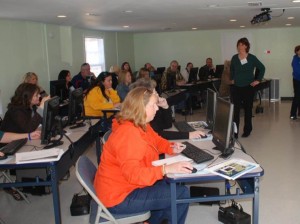 Teachers explore online learning.   Photo by C. Dindo